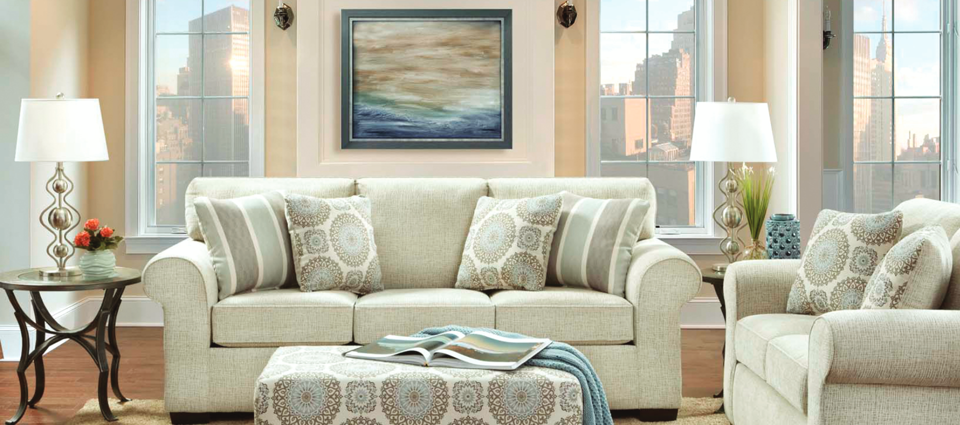 A living room with a couch and ottoman in it